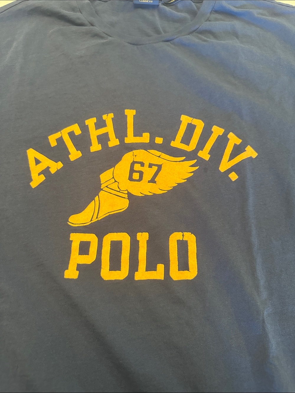 Polo by Ralph Lauren Navy T-Shirt with Yellow ATHL. DIV. Graphic